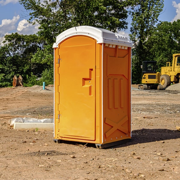 what is the cost difference between standard and deluxe porta potty rentals in Gans